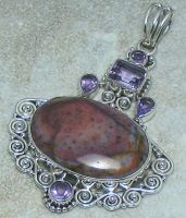 silver pendents with semi pricious stones