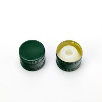 Twist-off aluminum caps for olive oil bottles