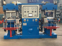 Plate vulcanizing press