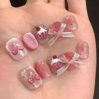 Sweet and cute short-style nail sticker for girls, hand-painted with cherry butterfly and cat-eye effect. Made of high-quality materials, it can be easily removed. Suitable for all kinds of nail styles. Comes with a set of stickers.