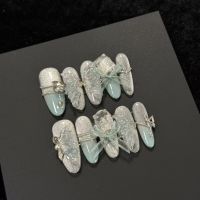 Summer advanced nail art style recommendation: ballet bow French manicure, brightening effect, latest design, handcrafted wearable nails.