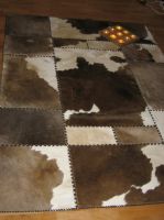 Patchwork rugs and cowhides
