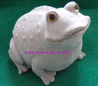 Offer frog-sculpture