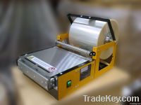 Overwrapping Machine for CD/DVD and Other Media Cases.