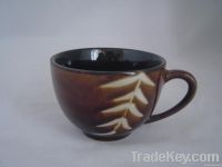 Ceramic cup and mug with antique imitation design