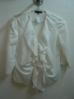 White ruffled linen blouse