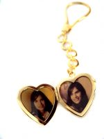 photo jewelry on gold pendant and locket
