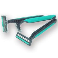 Twin blade disposable razor with rubber handle