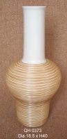 Ceramic vase combinated with strings of rattan