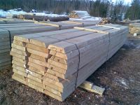 Sawn timber, round and square logs.