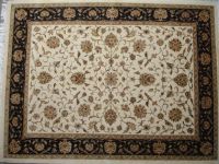 Handknotted wool silk rugs