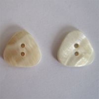 triangle shaped shell button