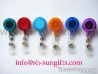 Retractable reel, badge holder, office stationery