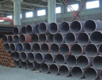 Seamless tube for fluid conveyance