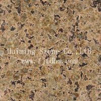 Sell Tropical Brown Granite Tiles Slabs