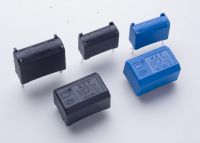 cooker and resisting electromagnetic wave capacitors