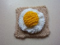 HAND KNITTED EGG ON TOAST