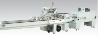 Shrink flow wrapper packaging machine