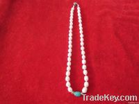 https://fr.tradekey.com/product_view/7-8mm-White-Freshwater-Genuine-Pearl-Necklace-With-1-Artificial-Jade-A-1947308.html