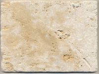 Tumbled filled travertine tiles