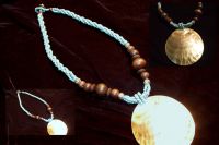 Blue bead necklace with large shell pendant