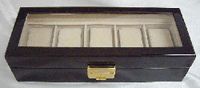 Wooden watch box with glass lid