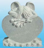 Tombstone with Angel and Flower Carving