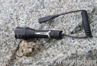 High power tactical flashlight with extension tube