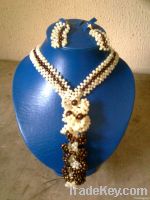 Neck beads and Hand Bags made from Beads, Hand made Hats, Hair Piece