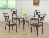 Glass top dining table and Metal dining chairs