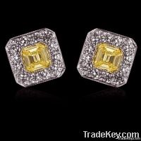 2 ct. fancy yellow diamonds stud earrings emerald cut