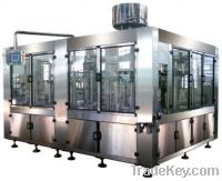 Carbonated drink filling and sealing machine
