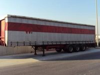 Trailer with tarpolin cover