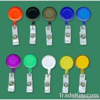 Retractable badge holder with clear vinyl strip