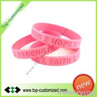 Lovely pink silicon wrist band with embossed logo