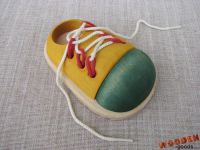 Handmade wooden educational lacing toy