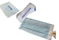 Self-sealing sterilization pouch