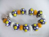 Lampworked bead bracelet (blue, yellow and white)