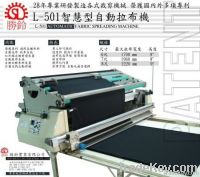 fabric spreading machine with cutter