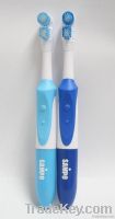 dual action head battery operated toothbrush