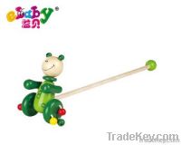 wooden push along toy with frog
