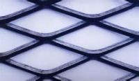 Flattened expanded wire mesh