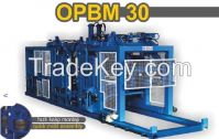 CONCRETE PAVER AND BLOCK MAKING MACHINE