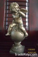 angel sitting on sphere