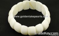 https://ar.tradekey.com/product_view/A-Grade-White-Shell-Bridge-Style-Bracelet-1947074.html