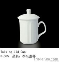 white porcelain cup with lid