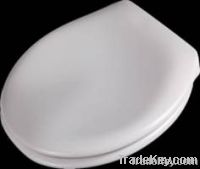 toilet seat with single push button quick release and soft close