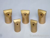 Tapered chisel type bit