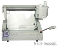 Glue binding machine