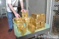 gold dust and bars - bullion bank